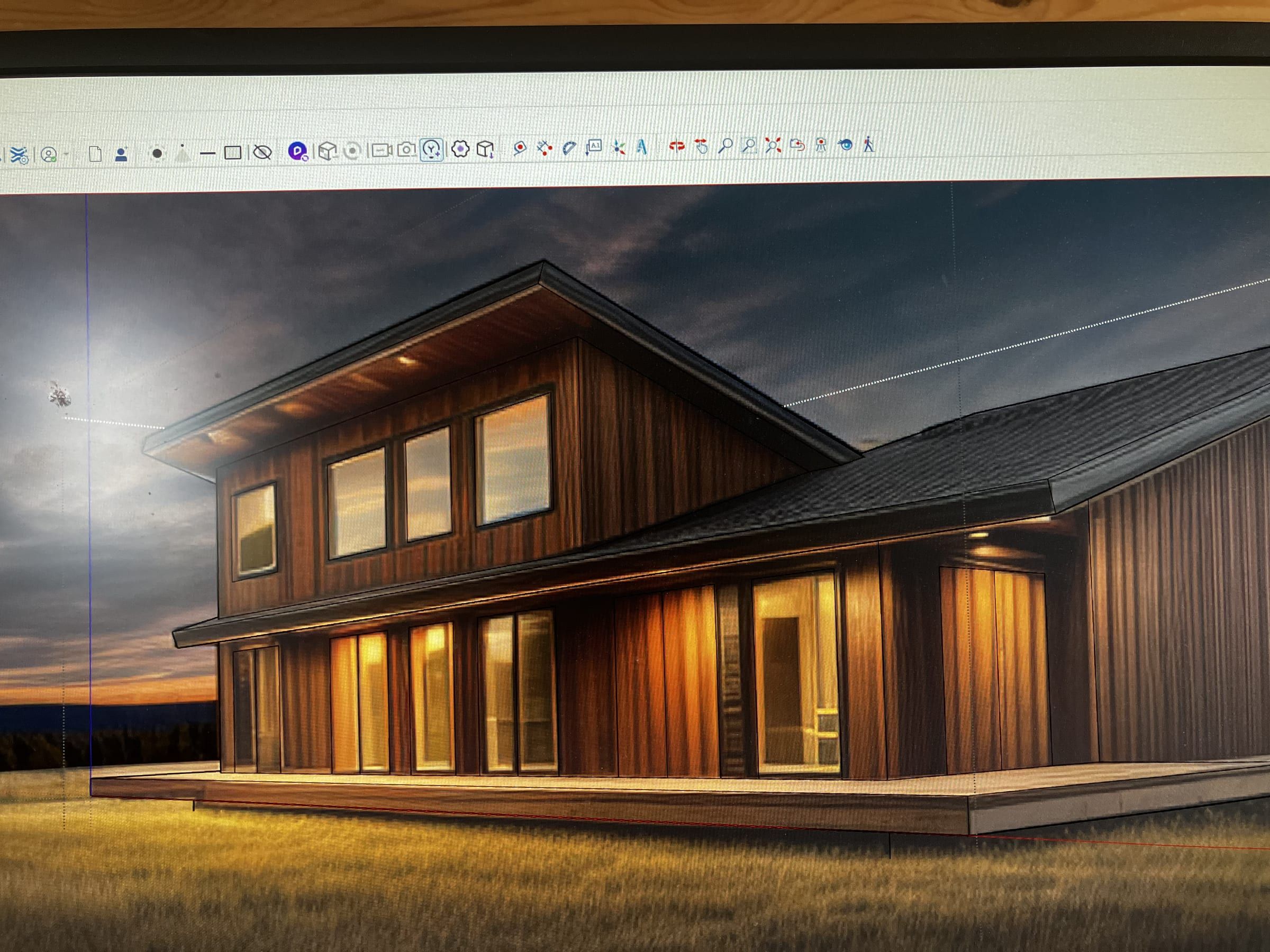3D design model of a shed-roof home on a computer screen